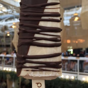 Popbar - Hazelnut. Dark chocolate on half. Caramel dark Choco drizzle all over. Tasty!!! - Desserts Near Me - Anaheim, California Popbar - Hazelnut. Dark chocolate on half. Caramel dark Choco drizzle all over. Tasty!!! - Desserts Near Me - Anaheim, California