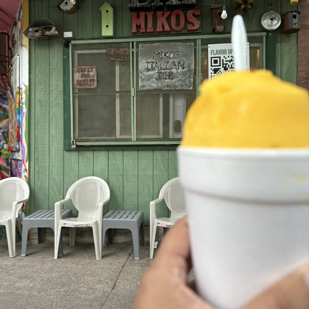 Miko's Italian Ice - a hand holding a cup of ice cream - Shaved Ice Near Me - Chicago, Illinois