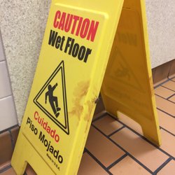 McDonald's - Is that blood on the Wet Floor sign?!?