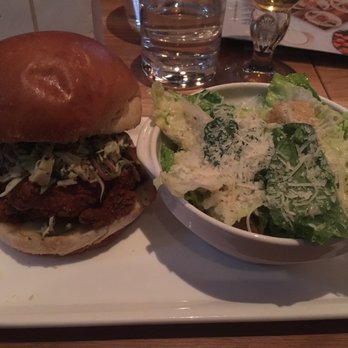Earls Kitchen + Bar - Nashville Hot Chicken Sandwich $16.50 with caesar salad (+$2) - Canadian (New) Near Me - Port Coquitlam, British Columbia