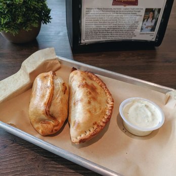 Maria Empanada - Sausage empanada, egg and potato empanada, side of sour cream - Empanadas Near Me - Denver, Colorado Maria Empanada - Sausage empanada, egg and potato empanada, side of sour cream - Empanadas Near Me - Denver, Colorado