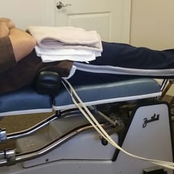 Active Care Chriopractic - Electrode massage, heat, and stretching blocks used before adjustment.