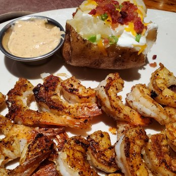 Outback Steakhouse - Grilled shrimp on the barbie with baked potato - Steakhouses Near Me - Altamonte Springs, Florida Outback Steakhouse - Grilled shrimp on the barbie with baked potato - Steakhouses Near Me - Altamonte Springs, Florida