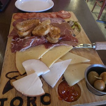 Toro Kitchen + Bar - Tablado Del Chef - delicious meat & cheese plate - Tapas Bars Near Me - San Antonio, Texas Toro Kitchen + Bar - Tablado Del Chef - delicious meat & cheese plate - Tapas Bars Near Me - San Antonio, Texas