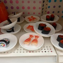 Michaels - These plastic sushi on a plate are so cute.