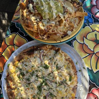 San Pedro Cafe - Jerk chicken nachos and Street Corn Pizza - Seafood Near Me - Hudson, Wisconsin