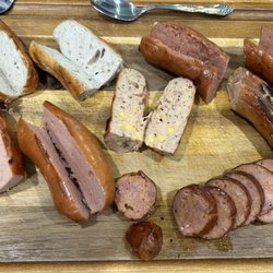 Rieker's Prime Meats - Grilled low - amazing outcome!! Bavarian bierwurst is amazing. Smoke kielbasa second. Two diff Knackwurst and a bratwurst.