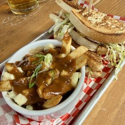 Chicken sandwich and poutine