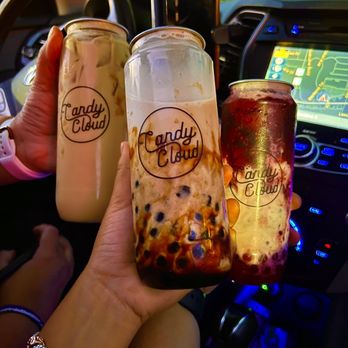 Candy Cloud - Rockford - a hand holding two drinks - Bubble Tea Near Me - Rockford, Illinois Candy Cloud - Rockford - a hand holding two drinks - Bubble Tea Near Me - Rockford, Illinois