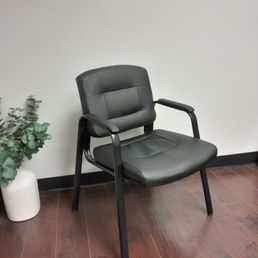 One chair someone left, took a picture quickly.. 15 people waiting in the hall some standing.
