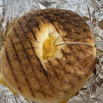 Take Away & Cafe - a bagel on tin foil - American Near Me - Brooklyn, New York