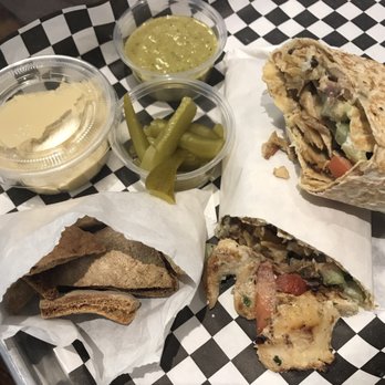 Yafa Hummus - Chicken shawarma with pita chips, side of pickles, extra side of hummus, and green chili sauce. - Mediterranean Near Me - Tracy, California Yafa Hummus - Chicken shawarma with pita chips, side of pickles, extra side of hummus, and green chili sauce. - Mediterranean Near Me - Tracy, California
