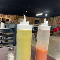 Mar Y Tierra Taqueria - Mild on left, habanero on right Both are good, but I like the flavor of the mild better.