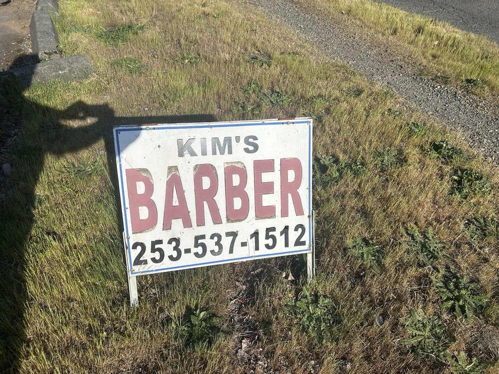 Kim's Barber Shop Logo