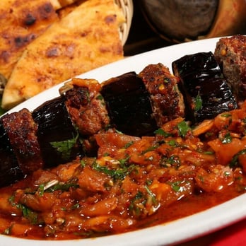 Testi Restaurant - Aubergine Kebab . Cooked with our homemade tomato sauce - Turkish Near Me - London, XGL Testi Restaurant - Aubergine Kebab . Cooked with our homemade tomato sauce - Turkish Near Me - London, XGL