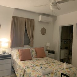 Aguirre Beach House - Master bedroom with private bath and queen bed.
