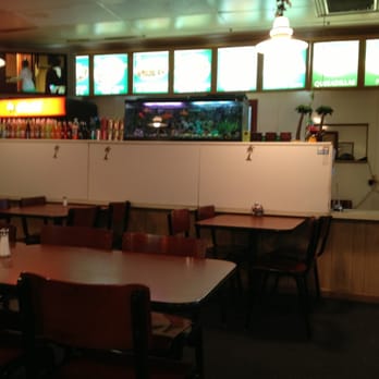 El Asador Restaurant - a dining area with tables and chairs - Salvadoran Near Me - Fredericksburg, Virginia