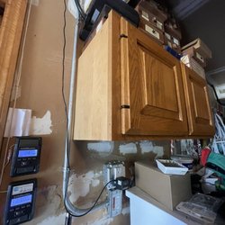 Powergen Electric - Electric outlet and line up the wall.