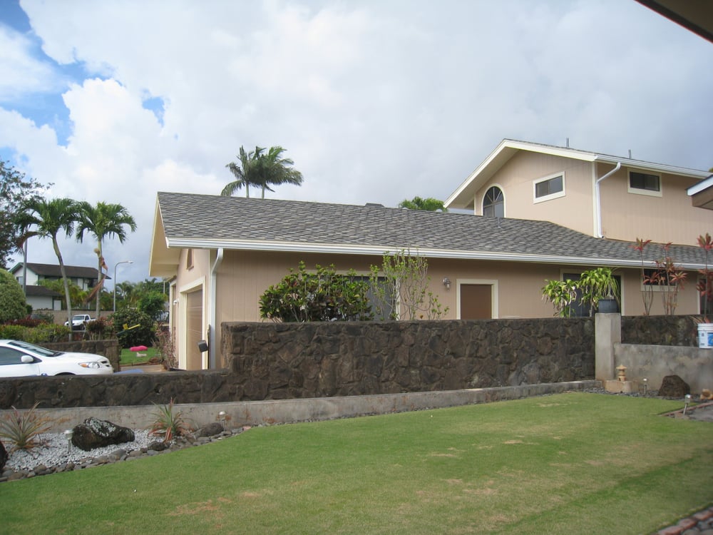 Slide of Action Roofing Hawaii