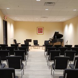 Midwest Musical Imports - Recital Hall with seating for 60 and a grand piano