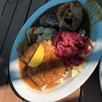 Restaurant Edelweiss - Sampler entree under German favorites Schnitzel (front), red cabbage, spatzle, roulade (behind red cabbage), sauerbraten - German Near Me - Bradenton, Florida Restaurant Edelweiss - Sampler entree under German favorites Schnitzel (front), red cabbage, spatzle, roulade (behind red cabbage), sauerbraten - German Near Me - Bradenton, Florida
