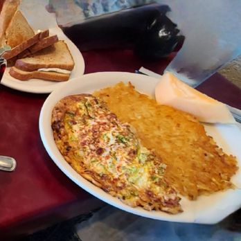 Nibs Restaurant - Turkey and cheese omelette with hash browns and toast. - American Near Me - Oakland, California