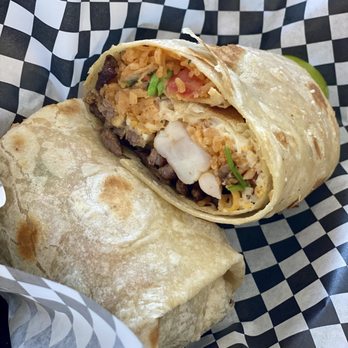 The Burrito City - Surf & Turf Burrito $13.65 Angus steak, shrimp, rice, salsa fresca, white sauce & cheese - Mexican Near Me - El Cajon, California