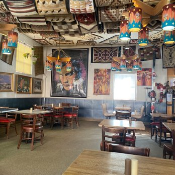 Frontier - The Navajo rug dining room replete with a giant velvet Elvis. - Mexican Near Me - Albuquerque, New Mexico