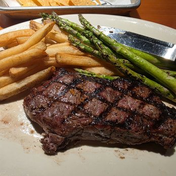 Black Angus Steakhouse - New york strip...asparagus and fries part of campfire feast...on sale at groupon...it was delicious - Steakhouses Near Me - Citrus Heights, California Black Angus Steakhouse - New york strip...asparagus and fries part of campfire feast...on sale at groupon...it was delicious - Steakhouses Near Me - Citrus Heights, California