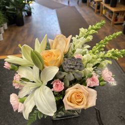 Coady Florist - Pastel flower arrangement with a succulent--Greater Boston floral delivery.