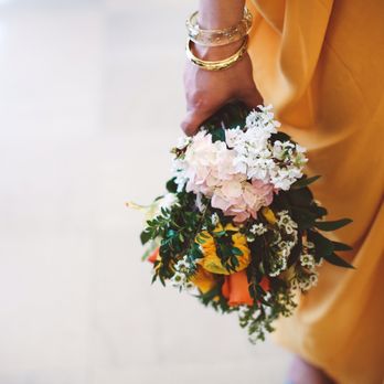 Floral Studio - a woman holding a bouquet of flowers - Florists Near Me - New York, New York Floral Studio - a woman holding a bouquet of flowers - Florists Near Me - New York, New York