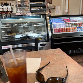 River Lights Cafe - a glass of iced tea and a pair of sunglasses - Cafes Near Me - Milford, Delaware