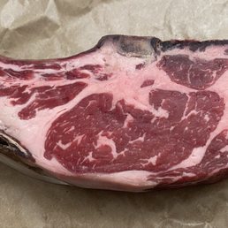 30 day dry aged Creekstone Farms bone-in ribeye.