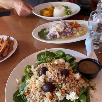 Alpamayo Restaurant - Quinoa salad,  Ceviche de Pescado and garlic shrimp in the back. - Peruvian Near Me - Lee, Massachusetts