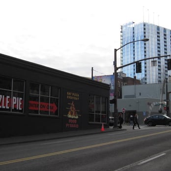 Sizzle Pie - The old and the new near The Pearl, with "Sizzle Pie" in that oppressive charcoal colored 1-story building at the left. - Pizza Near Me - Portland, Oregon
