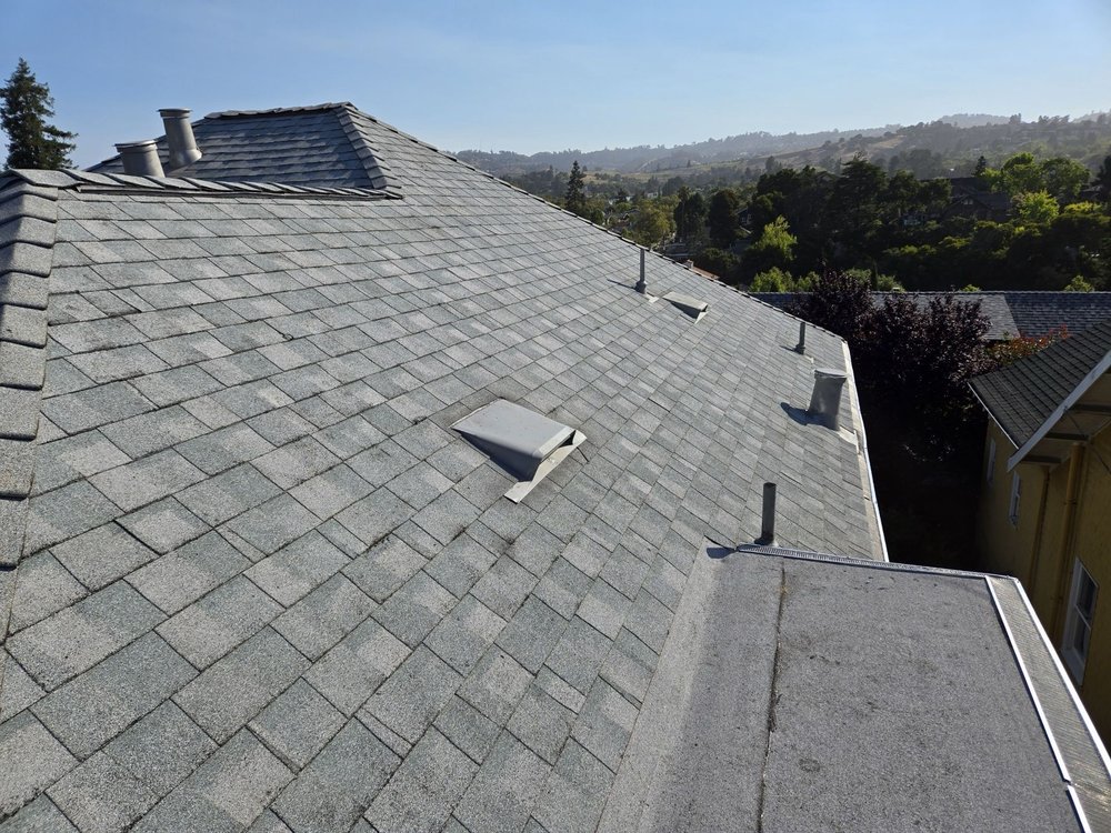 Slide of Astro Roofing