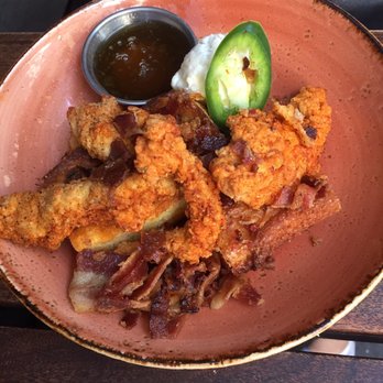 Eureka! - fried chicken in jalapeño infused maple syrup and corn bread - Bars Near Me - Cerritos, California