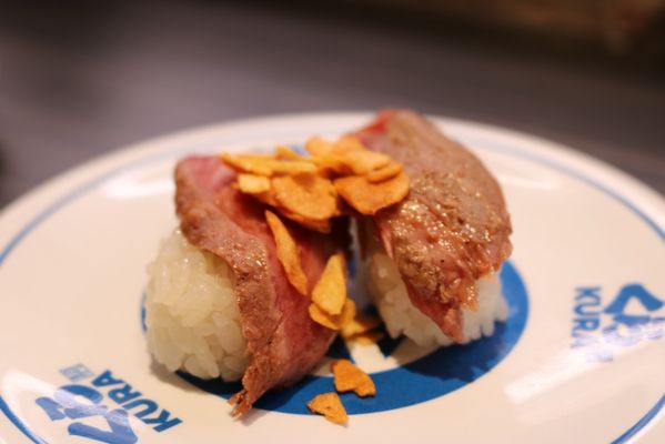 Kura Revolving Sushi Bar by null