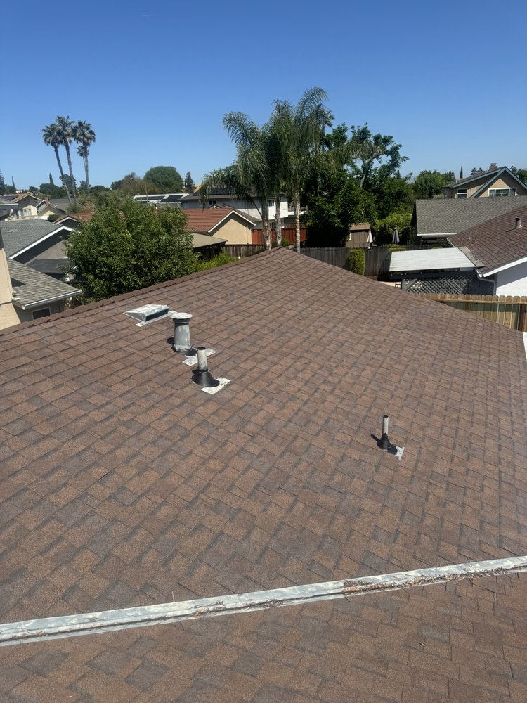 Slide of Essentials Roofing