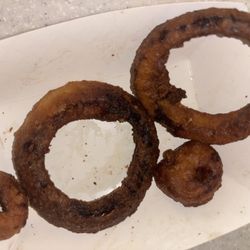 The Cheese Steak Shop - I ordered normal onion rings just to get it overcooked and burnt out , totally disappointed!!!