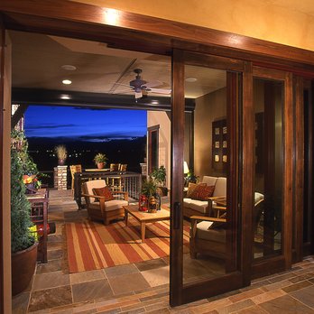 SE Denver Construction - a view of a patio from the living room - General Contractors Near Me