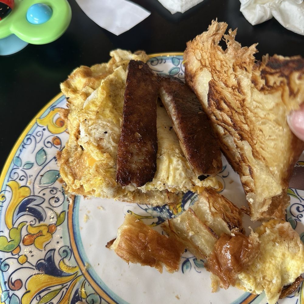 Yellowstone Grill - Croissant with links instead of patty cause they were out - American Near Me - Gardiner, Montana Yellowstone Grill - Croissant with links instead of patty cause they were out - American Near Me - Gardiner, Montana