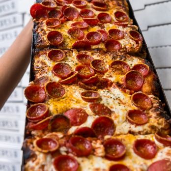 Pizza Collective - a pepperoni pizza in a pan - Pizza Near Me - New York, New York Pizza Collective - a pepperoni pizza in a pan - Pizza Near Me - New York, New York