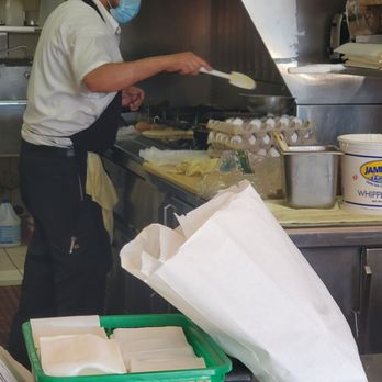 Bob's Burgers - Cooking with out gloves. - Burgers Near Me - Westminster, California Bob's Burgers - Cooking with out gloves. - Burgers Near Me - Westminster, California