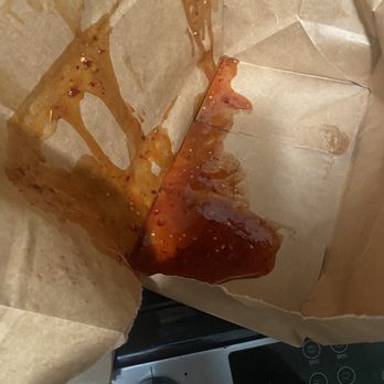 Wing Zone - The box on top had 20 wings in it and leaked on the other two boxes of wings. - Chicken Wings Near Me - Dayton, Ohio