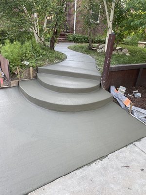 Stamped Concrete, Textured Finishes, Gorgeous Walkways and Concrete Steps - Stamped concrete is a decorative concrete technique that replicates the appearance of materials like brick, stone, or wood. It’s ideal for driveways, patios, and walkways. A concrete walkway is a functional and aesthetically pleasing addition to any property.
Call or text us today to make your dreams come to life! Stamped Concrete, Textured Finishes, Gorgeous Walkways and Concrete Steps - Stamped concrete is a decorative concrete technique that replicates the appearance of materials like brick, stone, or wood. It’s ideal for driveways, patios, and walkways. A concrete walkway is a functional and aesthetically pleasing addition to any property.
Call or text us today to make your dreams come to life!