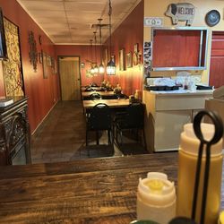Abby Lane Gourmet Burgers and Other Stuff - Inside the establishment, on the smaller side but nice and quiet where you could focus on dinner or your guest!