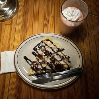 Milagro Coffee Y Espresso - Banana nutella crepe - Coffee & Tea Near Me - Las Cruces, New Mexico Milagro Coffee Y Espresso - Banana nutella crepe - Coffee & Tea Near Me - Las Cruces, New Mexico