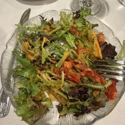 Portofino's Restaurant - Salad with French dressing. Minus tomatoes and olives, my choice. Was very fresh.