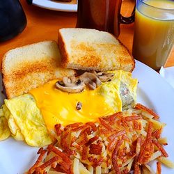 Kozy Nuk Cafe - Senior breakfast omelet with cheese and mushrooms ~ includes ~ hashbrowns or American fries ~ a variety of toast and your drink!!!